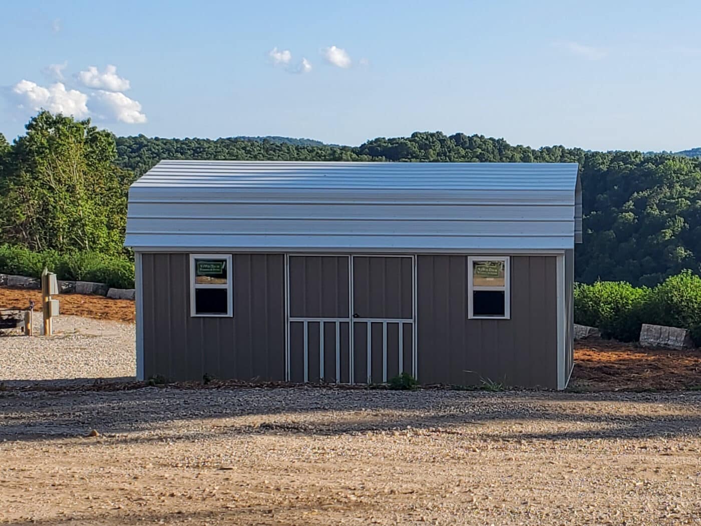 front view of a highwall lofted barn installed by ozark premier buildings