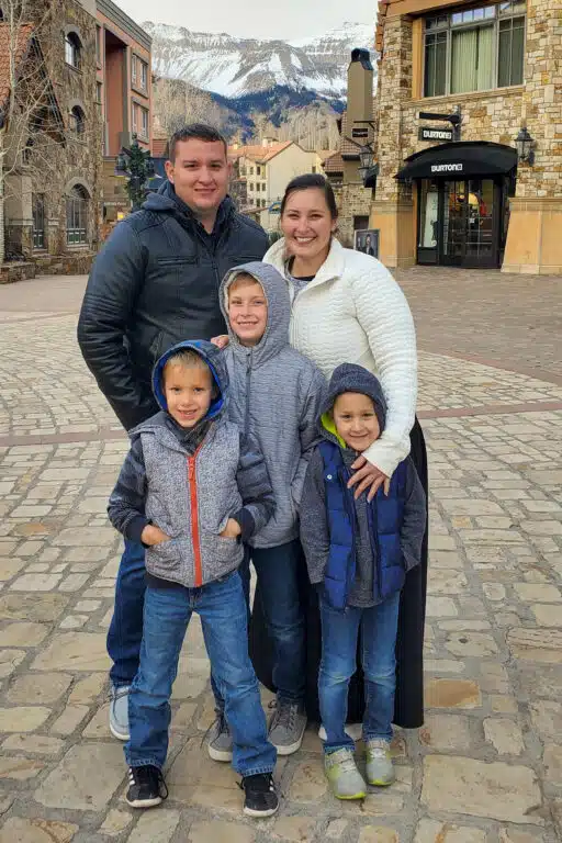 photo of Nelson, the owner of Ozark Premier Buildings, and his family