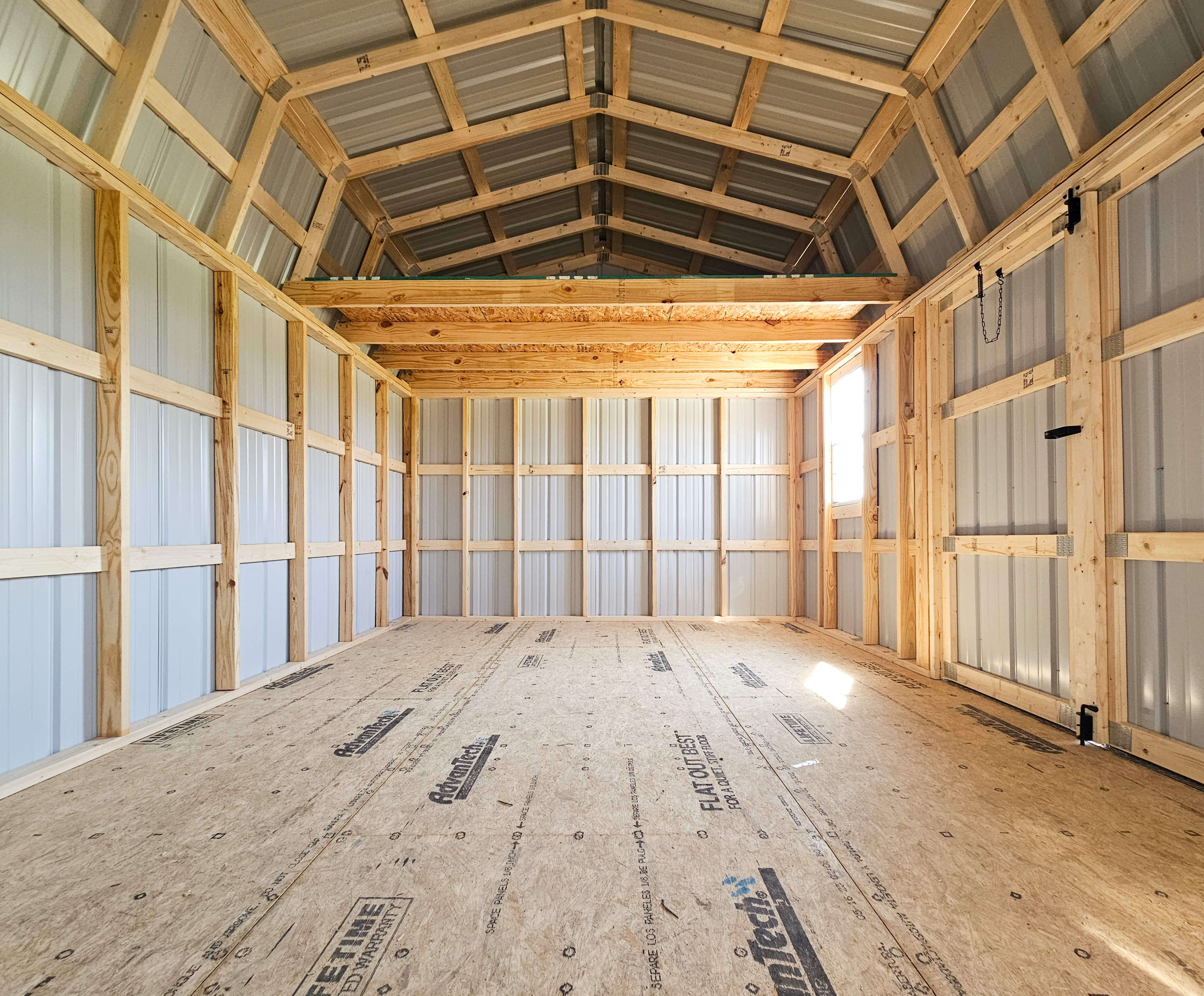 Interior of a storage shed with open floor space