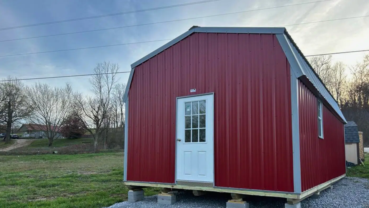 Deluxe Lofted portable cabin with barn roof and porch