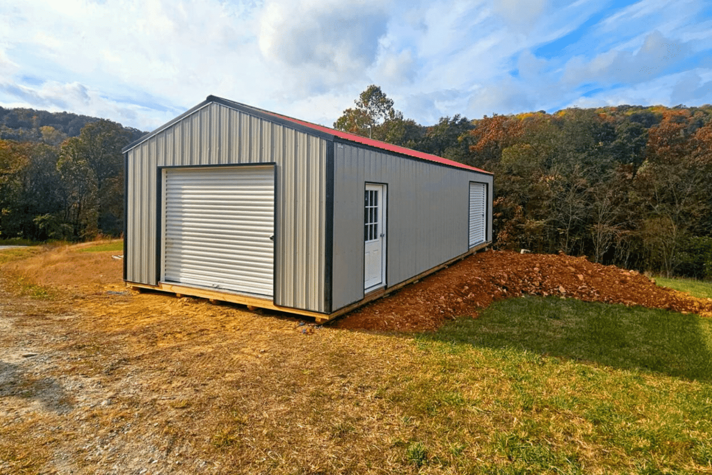 Metal prefab garage delivered on the top of a hill